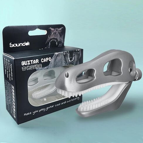 Jurassic T-Rex Guitar Capo - Dinosaur Skull Design with Silicone Teeth, Zinc Alloy Adjustable Clamp for Acoustic/Electric Guitar, Bass, Ukulele & Banjo (Silver) in Saudi Arabia