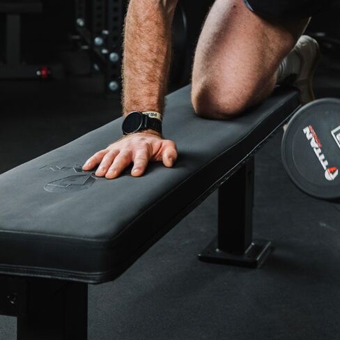Titan Fitness Elite Series Single Post Flat Bench, 2.5" Thick HeftyGrip Vinyl Pad, Rated 1,000 LB, Dedicated Home Gym Competition Weightlifting & Strength Training Utility Bench in Saudi Arabia