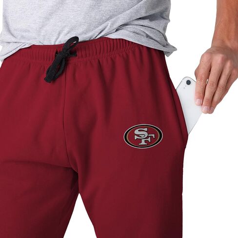 FOCO NFL Men's Officially Licensed Team Color Primary Logo Prime Time Football Sweatpants Joggers Pants in Saudi Arabia