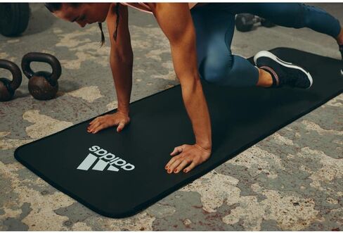 adidas 10mm Extra Thick Training Mat with Carrying Strap and Non-Slip Textured Base - Cushioned Workout Mat for Home Gym, Floor Workouts, and Intense Exercises - Portable and Durable in Saudi Arabia