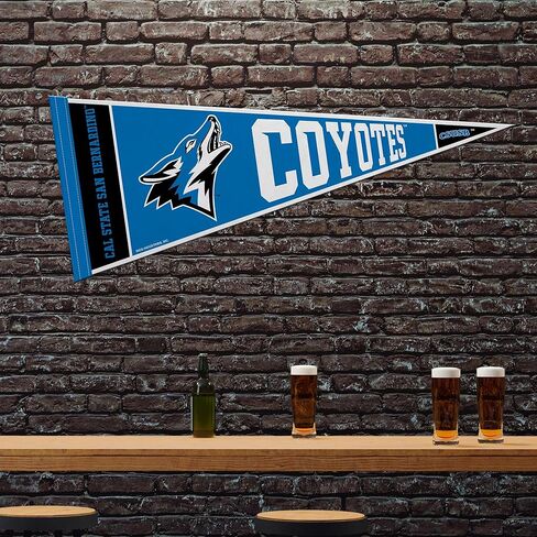 Rico Industries NCAA Cal State San Bernardino Coyotes 12" x 30" Felt Wall Décor Pennant - Great for Home/Bed Room/Man Cave Décor in Saudi Arabia