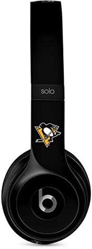 Skinit Decal Audio Skin Compatible with Beats Solo 2 Wired - Officially Licensed NHL Pittsburgh Penguins Solid Background Design in Saudi Arabia