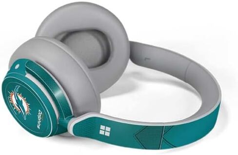 Skinit Skinit Audio Audio Skin متوافق مع سماعات السطح - تصميم فريق NFL Miami Dolphins مرخص رسميًا in Saudi Arabia