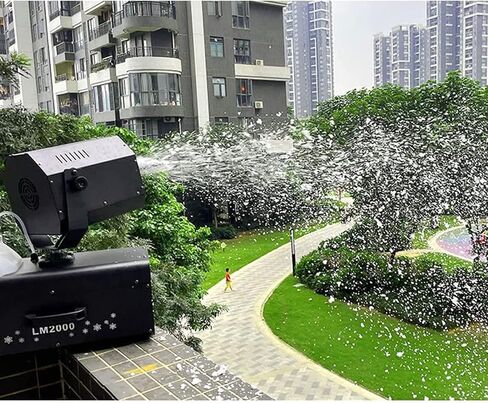 2000W Small Snow Machine Indoor and Outdoor Simulated Snow Stage Party Show Snow Machine with Remote Control 90° Shaking Head in Saudi Arabia