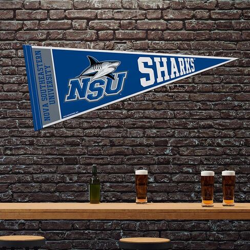 Rico Industries NCAA Nova Southeastern (or NSU) Sharks 12" x 30" Felt Wall Décor Pennant - Great for Home/Bed Room/Man Cave Décor in Saudi Arabia