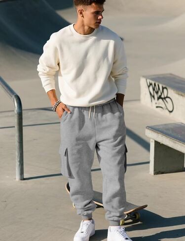 Men's Casual Cargo Pants Workout Joggers Stretch Sweatpants Lounge Athletic Pants Drawstring Pants with Pockets in Kuwait