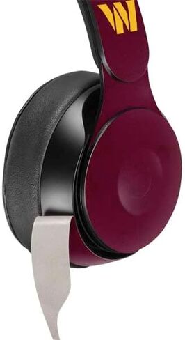 Skinit Decal Audio Audio Skin متوافق مع Beats Solo Pro - التصميم المفصل NFL واشنطن المرخص لها in Saudi Arabia