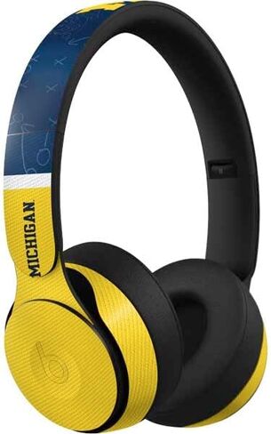 Skinit Schecal Audio Audio Skin متوافق مع Beats Solo Pro - تصميم تقسيم جامعة ميشيغان المرخصة رسميًا in Kuwait