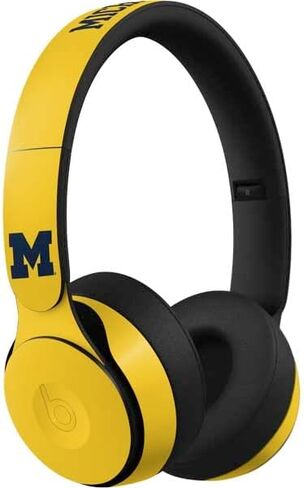 Skinit Decal Audio Skin Compatible with Beats Solo Pro - Officially Licensed University of Michigan Jersey Split Design in Saudi Arabia