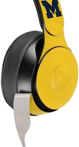 Skinit Decal Audio Skin Compatible with Beats Solo Pro - Officially Licensed University of Michigan Jersey Split Design in Saudi Arabia