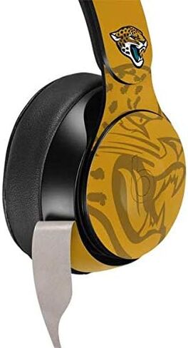 Skinit Decal Audio Skin Compatible with Beats Solo Pro - Officially Licensed NFL Jacksonville Jaguars Camo Design in Saudi Arabia