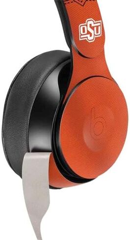 Skinit Schecal Audio Audio Skin متوافق مع Beats Solo Pro - تصميم جامعة ولاية أوكلاهوما المرخصة رسميًا in Saudi Arabia