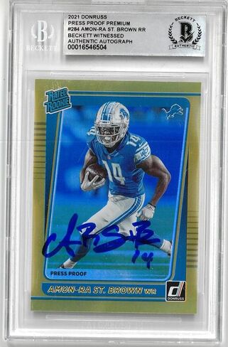 Amon -ra St. Brown موقعة 2021 بطاقة Donruss Press Proof Premium Rookie - بطاقات صاعد كرة قدم كرة القدم in Saudi Arabia