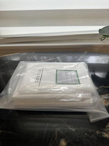 Zorica Large Plastic Storage Bags with Ties, 40x60 inches, Heavy Duty, Clear,tight seal in Saudi Arabia