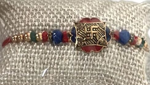 Elegant Silver Chain Rakhi with Red Swastik Motif – Oval Pendant Stainless Steel Rakhi Bracelet for Brother | Raksha Bandhan Religious Gift (1 Piece) in Saudi Arabia