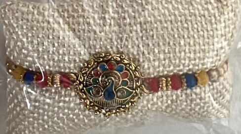 Elegant Silver Chain Rakhi with Red Swastik Motif – Oval Pendant Stainless Steel Rakhi Bracelet for Brother | Raksha Bandhan Religious Gift (1 Piece) in Saudi Arabia