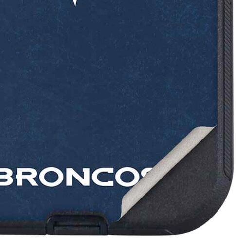 Skinit Decal Phone Skin Compatible with OtterBox Defender iPhone 15 Pro Max - Officially Licensed NFL Denver Broncos - Distressed Design in Saudi Arabia