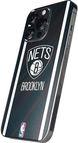 Skinit Schecal Phone Skin متوافق مع iPhone 15 Pro - تصميم NBA Brooklyn Nets Jersey مرخص رسميًا in Saudi Arabia