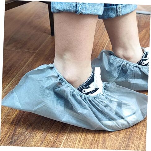Cabilock 100Pcs Non Woven Shoe Covers Thicken Home Shoes Case Comfortable Overshoes Slip Practical for Dentists Builders Indoor Use in Saudi Arabia