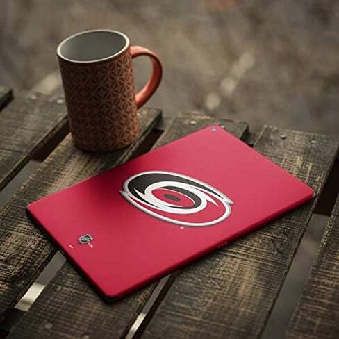 Skinit Decal Tablet Skin Compatible with iPad Air - Officially Licensed NHL Carolina Hurricanes Solid Background Design in Saudi Arabia
