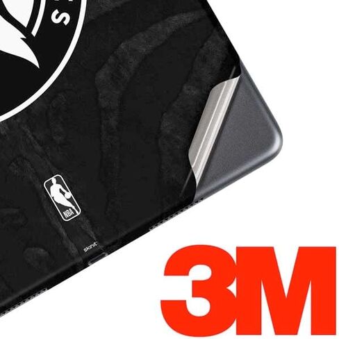Skinit Skinit Tablet Skin Compatible مع iPad Air 2 - NBA Minnesota Timberwolves Black Animal Design in Saudi Arabia
