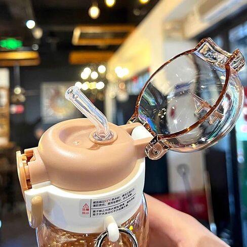 Cartoon capybara straw cup, cute sports bottle with shoulder strap, suitable for school, office, travel, and outdoor use. (760ml) in Saudi Arabia