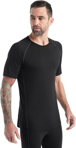 قميص Icebreaker Merino الرجالي ذو قاعدة خفيفة الوزن وأكمام قصيرة ورقبة دائرية، طبقات من صوف ميرينو المضاد للحكة in Kuwait