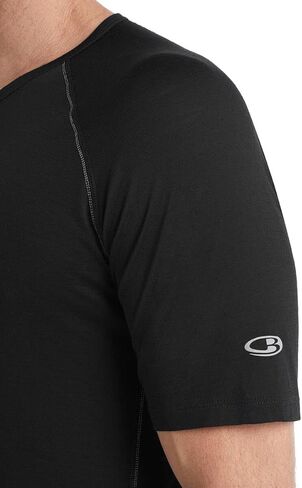 قميص Icebreaker Merino الرجالي ذو قاعدة خفيفة الوزن وأكمام قصيرة ورقبة دائرية، طبقات من صوف ميرينو المضاد للحكة in Kuwait