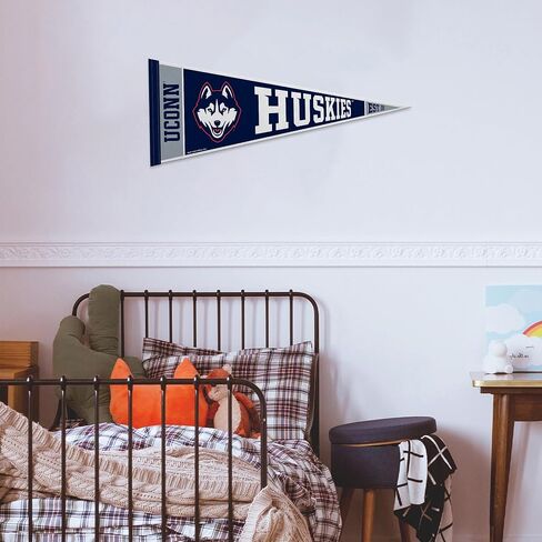 Rico Industries NCAA Connecticut Huskies - UConn Rally 12 "× 30" in Saudi Arabia