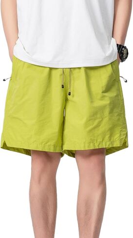 Unisex Lightweight Athletic Shorts Quick Dry Loose Fit Breathable Running Workout Gym Shorts with Zipper Pockets in Saudi Arabia
