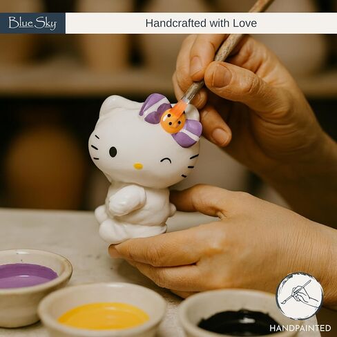 Hello Kitty & Cinnamoroll Mummy Salt & Pepper Shakers التي تم إنشاؤها بواسطة Blue Sky Clayworks in Saudi Arabia