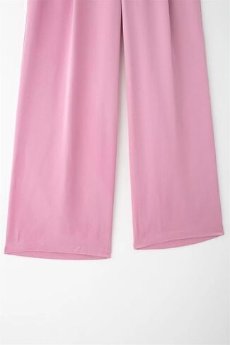 Women's Retro Casual Solid Color Draped Pocket Straight Loose Pants in Saudi Arabia