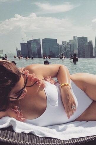 Pink Flowers Backless One Piece Swimsuit for Girls U Shape Open Back Jumpsuit in Saudi Arabia