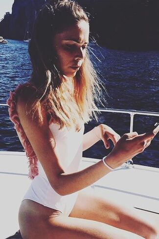 Pink Flowers Backless One Piece Swimsuit for Girls U Shape Open Back Jumpsuit in Saudi Arabia