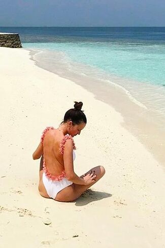 Pink Flowers Backless One Piece Swimsuit for Girls U Shape Open Back Jumpsuit in Saudi Arabia