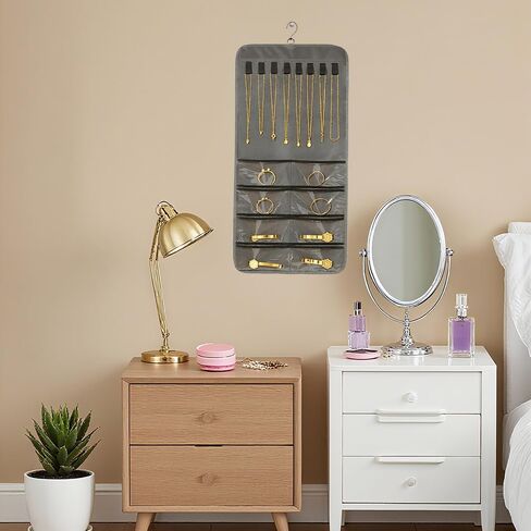 Stylish Hanging Jewelry Organizer: Dual Zip Pockets, Double-Sided Hanger, Necklace & Earring Holder, Dustproof Wall-Mounted Bag - jewelry storage bags in Saudi Arabia