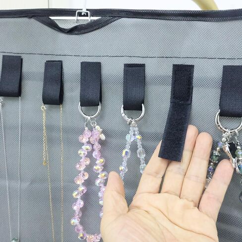 Stylish Hanging Jewelry Organizer: Dual Zip Pockets, Double-Sided Hanger, Necklace & Earring Holder, Dustproof Wall-Mounted Bag - jewelry storage bags in Saudi Arabia