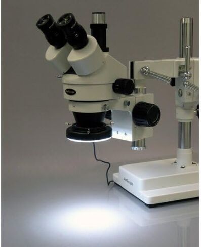 AmScope SM-4TZ-144 مجهر تكبير ستيريو ثلاثي العينيات احترافي، عدسات WH10x، تكبير 3.5X-90X، هدف تكبير 0.7X-4.5X، ضوء حلقة LED 144 لمبة، حامل ذراع مزدوج، 110 فولت-240 فولت، يتضمن 0.5X و عدسة بارلو 2.0X in Saudi Arabia