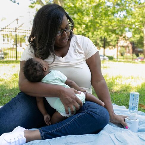 Dr. Brown's Travel Baby Bottle Warmer, Quickly Warms Breast Milk and Water for Formula On-The-Go, Portable, Rechargeable, Cordless with 3 Bottle Adapters in Kuwait