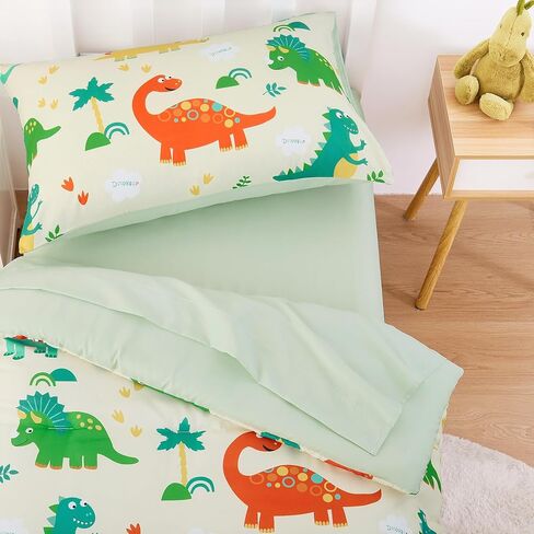 Wake in Cloud - Dinosaur Toddler Bedding مجموعة للأولاد ، الديناصورات الملونة اللطيفة ، 4 قطع سرير سرير ناعم بما في ذلك الحافز والألواح والوسادة ، والأزرق البحري in Saudi Arabia