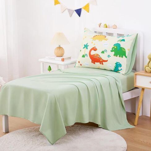 Wake in Cloud - Dinosaur Toddler Bedding مجموعة للأولاد ، الديناصورات الملونة اللطيفة ، 4 قطع سرير سرير ناعم بما في ذلك الحافز والألواح والوسادة ، والأزرق البحري in Saudi Arabia