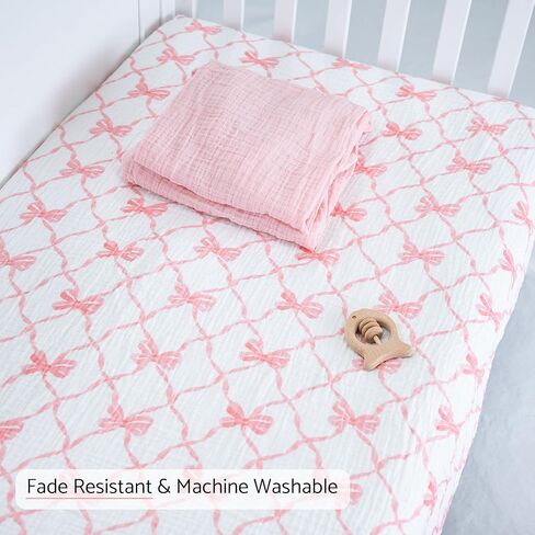 LollyBanks Muslin Crib Sheet 1 Pack, Soft and Breathable 100% Cotton Crib Fitted Sheets for Girls, Cozy and Snug Baby Sheet for Standard 52"x28" Mattress, Baby Bedding Essentials (Pink Bow Print) in Kuwait
