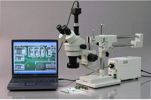 AMSCOPE SM-4TY Professional Trinocular Zoom Microscope ، WH10x Eyepieces ، 7x-90x التكبير ، هدف التكبير 0.7x-4.5x ، الإضاءة المحيطة ، حامل طفرة مزدوج الذراع ، يشمل 2.0x عدسة بارلو in Saudi Arabia