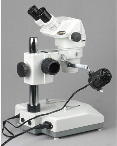 AmScope ZM-2B Professional Binocular Stereo Zoom Microscope, EW10x Eyepieces, 6.7X-45X Magnification, 0.67X-4.5X Zoom Objective, Upper and Lower Halogen Lighting, Pillar Stand, 110V-120V in Saudi Arabia