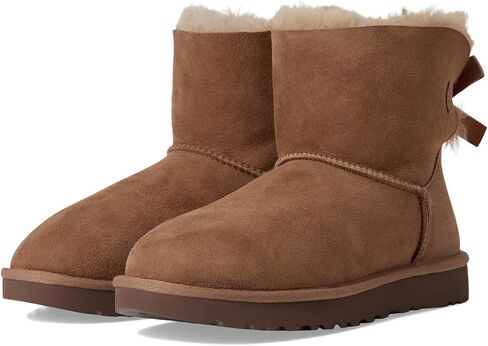 Ugg Women's Mini Bailey Bow II Fashy Boot ، Rocky Oak ، 7 in Saudi Arabia