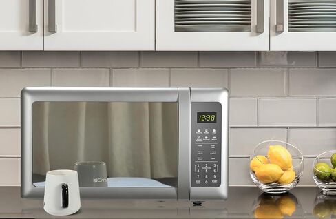 فرن ميكروويف إيمرسون MW7601SL مدمج على سطح الطاولة مع باب أنيق ذو مرآة 10 مستويات طاقة، 6 قوائم تلقائية، قرص دوار زجاجي وقفل آمن للأطفال، 0.7 قدم مكعب. قدم، فضي in Kuwait