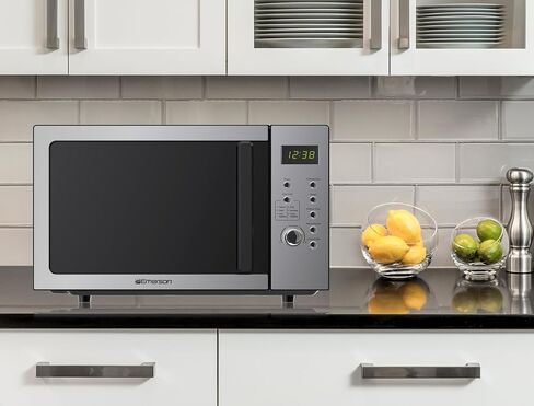 Emerson MW7601SL Compact Countertop Microwave Oven with Sleek Mirrored Finish Door 10 Power Levels, 6 Auto Menus, Glass Turntable and Child Safe Lock, 0.7 Cu. Ft, Silver in Kuwait