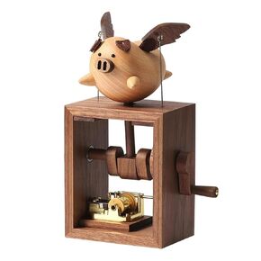 Wooden Flying Pig Little Music Box Ornament Hand-cranked Box Black Walnut Engraved Music Box Wood Hand Rocking Statue Creative Mother Day Christmas Birthday Gift