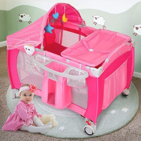 HONEY JOY Pack and Play with Bassinet, 4-in-1 Portable Baby Playard w/Changing Table, Net & Cute Toys, Diaper Storage Bag, Music Box, Wheels with Brake, Foldable Newborn Play Yard w/Carry Bag(Pink) in Saudi Arabia