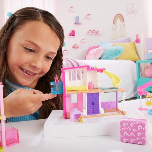Barbie Mini BarbieLand Doll House Sets, Mini Dreamhouse with Surprise 1.5-inch Doll, Furniture & Accessories, Plus Elevator & Pool in Saudi Arabia